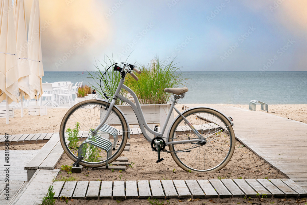 Fototapeta premium Summer bike ride along the beach