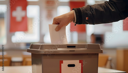 Stimmabgabe in der Schweiz, Stimmzettel wird in eine Urne geworfen