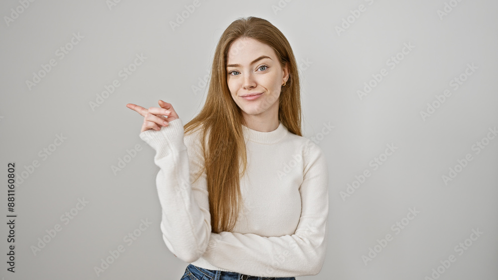 A beautiful, young, blonde woman posing confidently against a white background, radiating casual elegance. A beautiful, young, blonde woman posing confidently against a white background, radiating casual elegance.