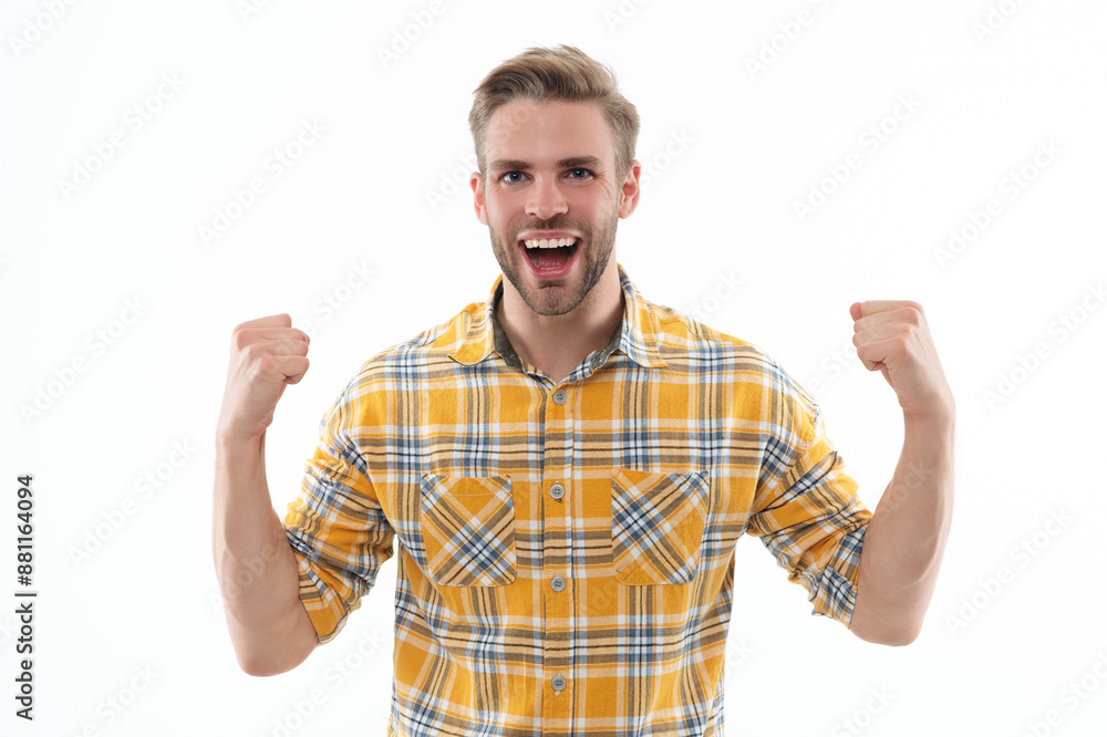 Trendy male fashion style. Male casual style. Face portrait. Caucasian casual guy. Man in checkered shirt isolated on white. Stylish man with stylish hairstyle. Celebrating success Trendy male fashion style. Male casual style. Face portrait. Caucasian casual guy. Man in checkered shirt isolated on white. Stylish man with stylish hairstyle. Celebrating success