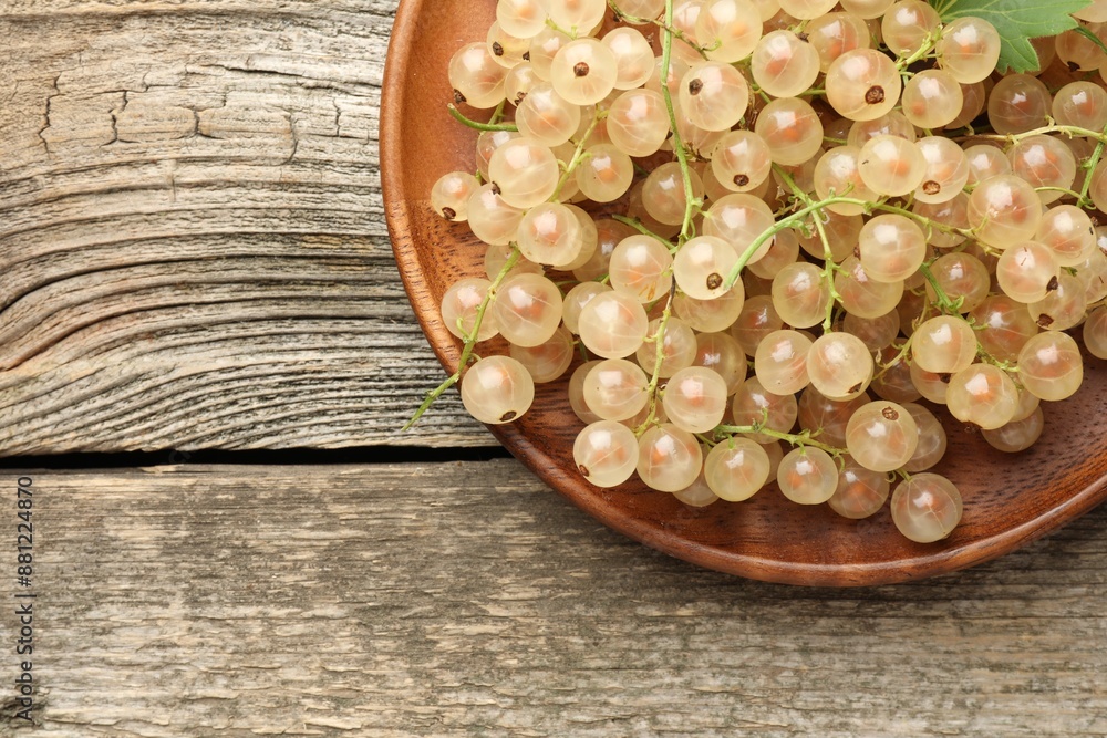Fresh white currant berries on wooden table, top view. Space for text Fresh white currant berries on wooden table, top view. Space for text