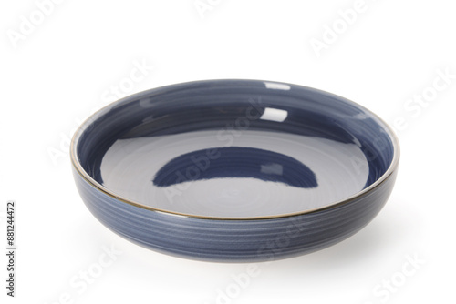 Blue ceramic plate on white background