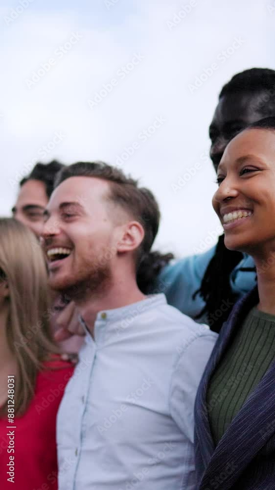Diverse group of people having fun together. Multiethnic friends celebrating outdoors. Life style youth community. Vertical video Diverse group of people having fun together. Multiethnic friends celebrating outdoors. Life style youth community. Vertical video