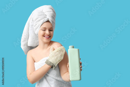 Happy young woman in towel ...