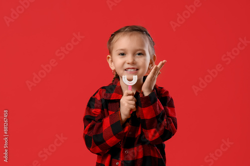 Happy little girl in checke...