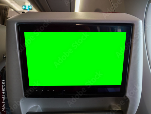 In-Flight Entertainment with Green Screen, Seat back Screen with Green Screen in Airplane. Travel, Tourism and Flight Advertising Concept
