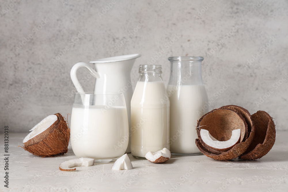 Various dishes with tasty coconut milk on grunge background Various dishes with tasty coconut milk on grunge background