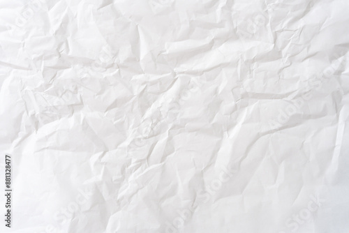 Top view of white wrinkled or crumpled paper texture used as white wrinkled paper background texture
