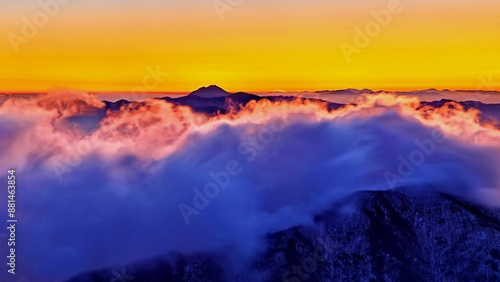 High angle and sunrise view of sea ​​of ​​clouds on the peak and ridges of Deogyusan Mountain near Muju-gun, South Korea 