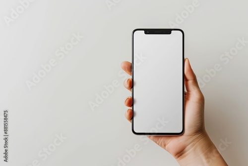 Smartphone mockup on hand with white blank screen created with Generative AI
