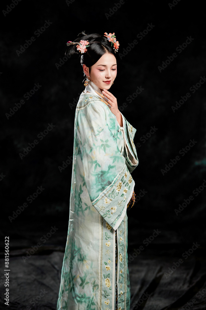 Asian,woman,showing,court,costumes,of,the,Qing,Dynasty,in,China Asian,woman,showing,court,costumes,of,the,Qing,Dynasty,in,China