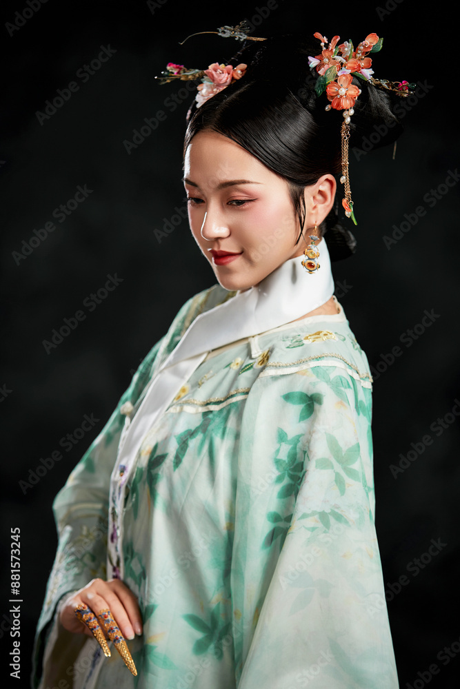 Asian,woman,showing,court,costumes,of,the,Qing,Dynasty,in,China Asian,woman,showing,court,costumes,of,the,Qing,Dynasty,in,China