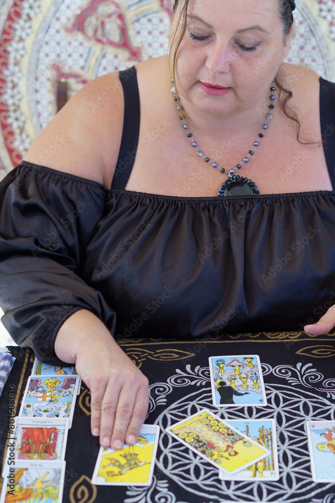 gypsy fortune teller dressed in black casting tarot cards gypsy fortune teller dressed in black casting tarot cards