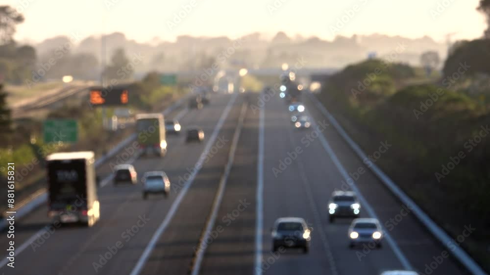 Soft focus of traffic driving expressway in Kapiti, New Zealand Soft focus of traffic driving expressway in Kapiti, New Zealand