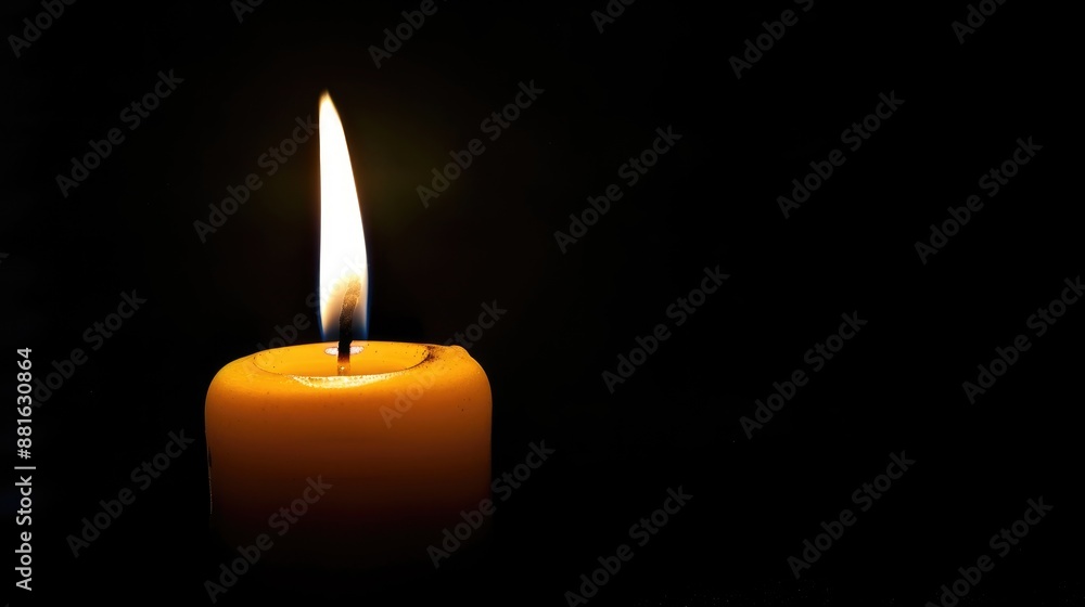 Close up of a single candle flame on a black background Close up of a single candle flame on a black background