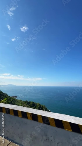 Scenic footage of Hai Van Pass, the winding highway connecting Da Nang to Hue, Vietnam. This picturesque route offers breathtaking views of the mountains, sea, and lush landscapes, perfect for adventu photo