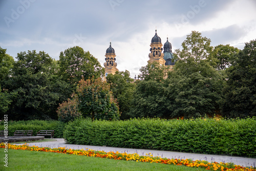 The Hofgarten is a historic park near the old town of Munich (Germany). In the background the towers of the Theatiner Church on Odeonsplatz photo