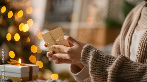 Man redeeming digital gift card with specific code, looking at screen with serious expression. photo