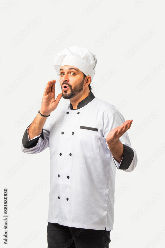 Smiling Asian Indian chef or professional cook with folded hands, isolated white background. Smiling Asian Indian chef or professional cook with folded hands, isolated white background.