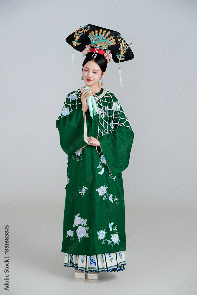 Asian,woman,showing,court,costumes,of,the,Qing,Dynasty,in,China Asian,woman,showing,court,costumes,of,the,Qing,Dynasty,in,China