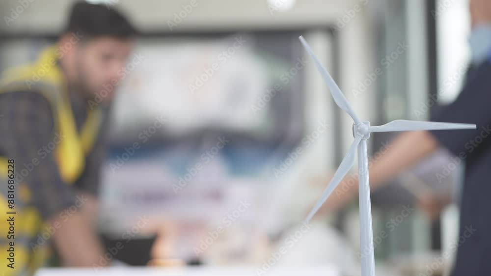 Wind turbine model that rotates at the front. engineering designer Discussions are underway to build a building and install solar cells that produce electricity in the home. Wind turbine model that rotates at the front. engineering designer Discussions are underway to build a building and install solar cells that produce electricity in the home.