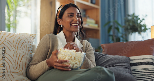 Canvastavla Smile, girl and relax on sofa with popcorn for watching movies, streaming comedy film and unwind on weekend for break