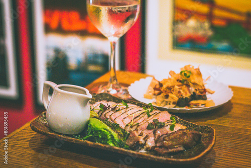 Photography Grilled IBERICO PORK RIBEYE with white miso and gem lettuce