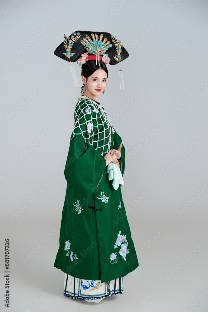 Asian,woman,showing,court,costumes,of,the,Qing,Dynasty,in,China Asian,woman,showing,court,costumes,of,the,Qing,Dynasty,in,China