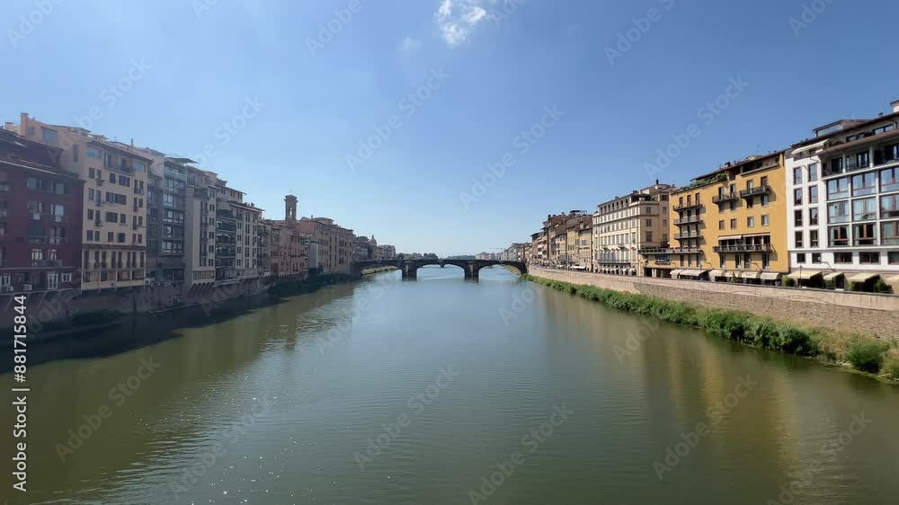 Arno river in Florence overview of the bridge in sunny day. High quality 4k footage Arno river in Florence overview of the bridge in sunny day. High quality 4k footage