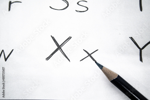 PENCIL AND ALPHABET LETTER X