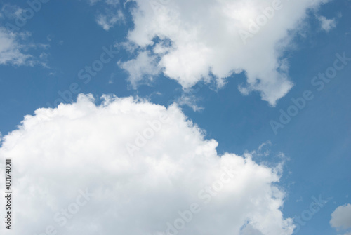 Clouds in the sky. Cloudy sky. Blue sky with big clouds. Blue and white background.