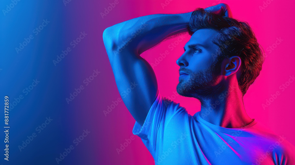 Vibrant image of a man flexing biceps against a dark backdrop. Vibrant image of a man flexing biceps against a dark backdrop.