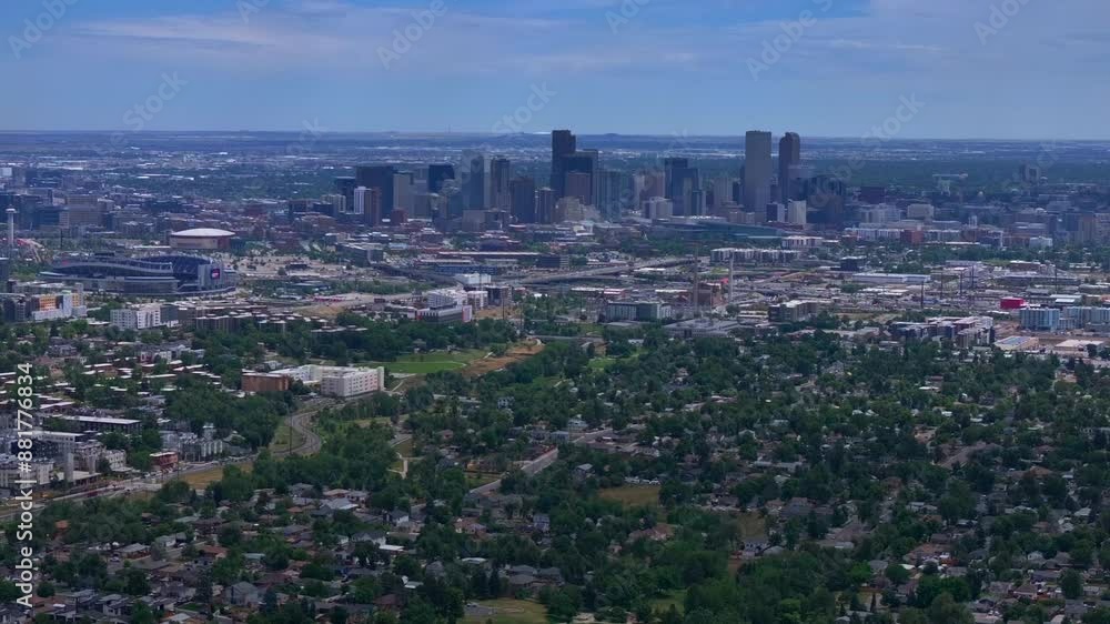Summer downtown Denver Colorado aerial drone Mile High city skyscrapers neighborhood homes blue skies cloudy 6th avenue colfax RTD line front range foothills landscape forward parallax motion Summer downtown Denver Colorado aerial drone Mile High city skyscrapers neighborhood homes blue skies cloudy 6th avenue colfax RTD line front range foothills landscape forward parallax motion