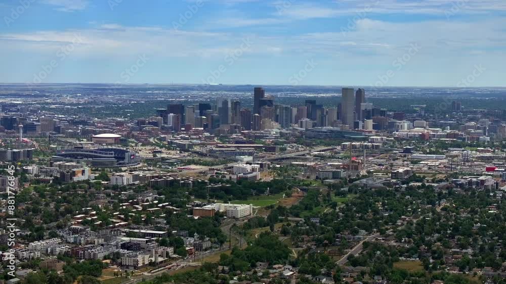 Summer downtown Denver Colorado aerial drone Mile High city skyscrapers neighborhood homes blue skies cloudy 6th avenue colfax RTD line front range foothills landscape forward up motion Summer downtown Denver Colorado aerial drone Mile High city skyscrapers neighborhood homes blue skies cloudy 6th avenue colfax RTD line front range foothills landscape forward up motion