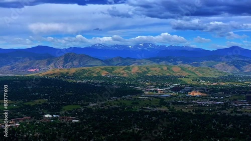 Summer Denver Colorado aerial drone Golden Arvada Lakewood cloudy front range foothills landscape Mount Blue Sky Red Rocks Amphitheater neighborhood homes blue skies clouds forward pan reveal motion photo