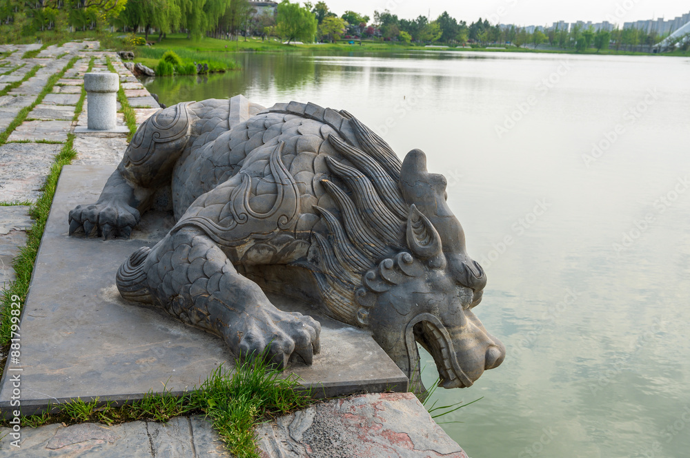 Chinese mythical animal sculptures by the river Chinese mythical animal sculptures by the river