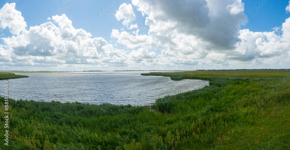 Groningen, Netherlands - August 8th 2023: Panoramic view over the natural beauty of Lauwersmer