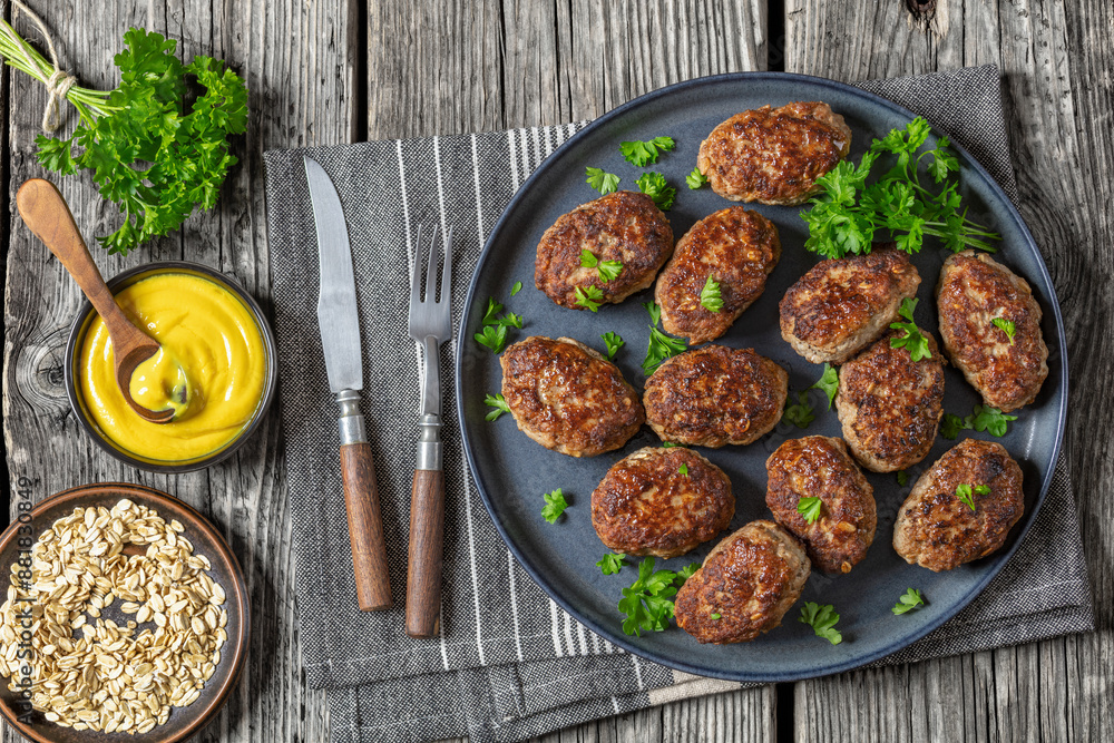 frikadeller, danish meatballs on a plate, top view frikadeller, danish meatballs on a plate, top view