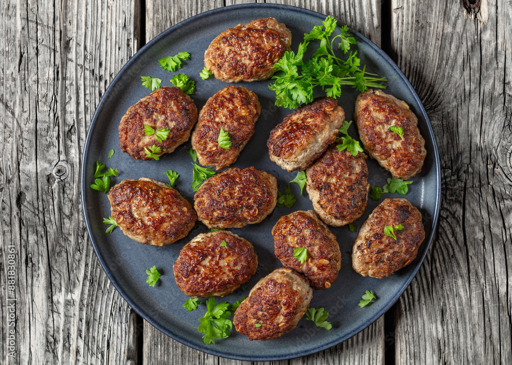 frikadeller, danish meatballs on a plate, top view frikadeller, danish meatballs on a plate, top view
