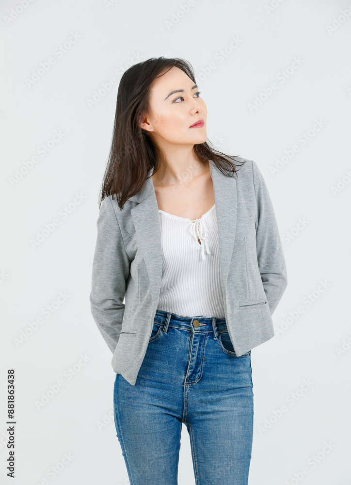 Asian female attractive smiling happy cheerful successful employee businesswoman, she wearing casual classic blazer and standing on white background isolated studio portrait. Lifestyle concept. Asian female attractive smiling happy cheerful successful employee businesswoman, she wearing casual classic blazer and standing on white background isolated studio portrait. Lifestyle concept.
