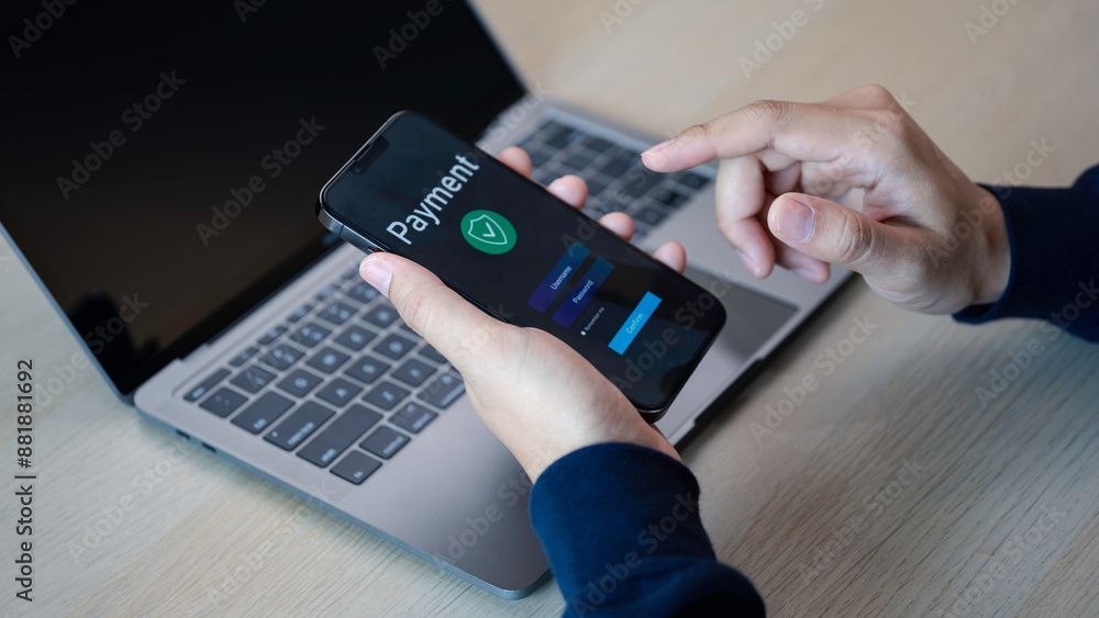 Buy now pay later online shopping concept. Hands holding mobile phone on blurred store as background. Online shopping. Paying after delivery. Complete the payment after purchase at no added cost.