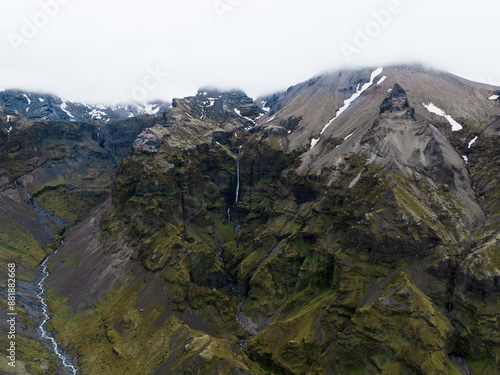 Obraz na płótnie View from above, stunning aerial view of a dramatic landscape with a beautiful waterfall, Iceland. w salonie