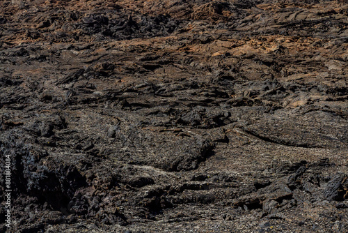 Background. Close-up. 'Malpais' - the rough, undulating surface of solidified lava.  Colorada volcano Lanzarote, Canary Islands, Spain
