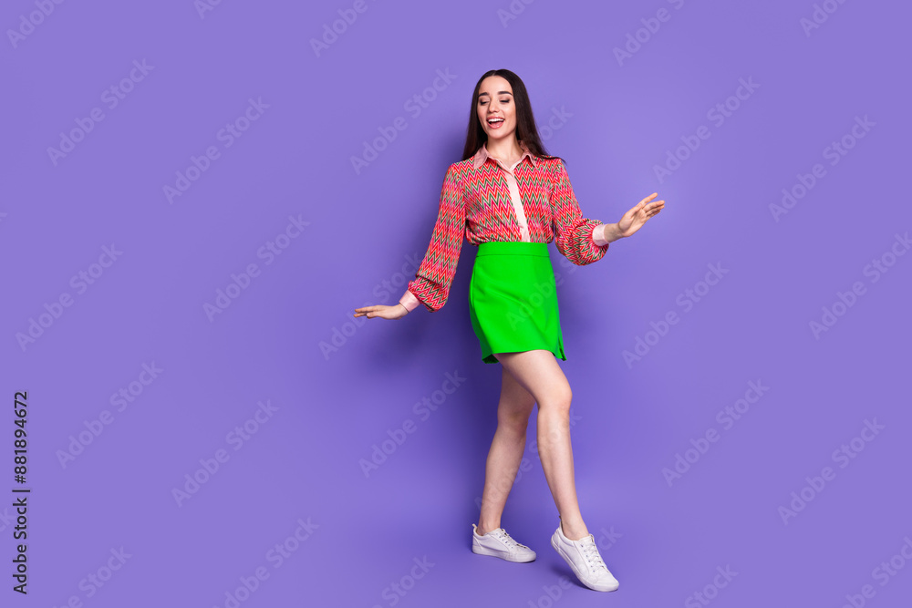 Full size photo of pretty young girl dance enjoy discotheque wear trendy pink outfit isolated on purple color background Full size photo of pretty young girl dance enjoy discotheque wear trendy pink outfit isolated on purple color background