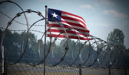 Billede på lærred Barbed wire fence and flag of Liberia - 3d illustration