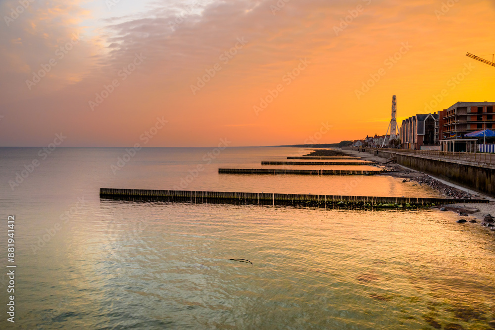 View of promenade of resort town of Zelenogradsk on the coast of Baltic sea at sunrise. Russia