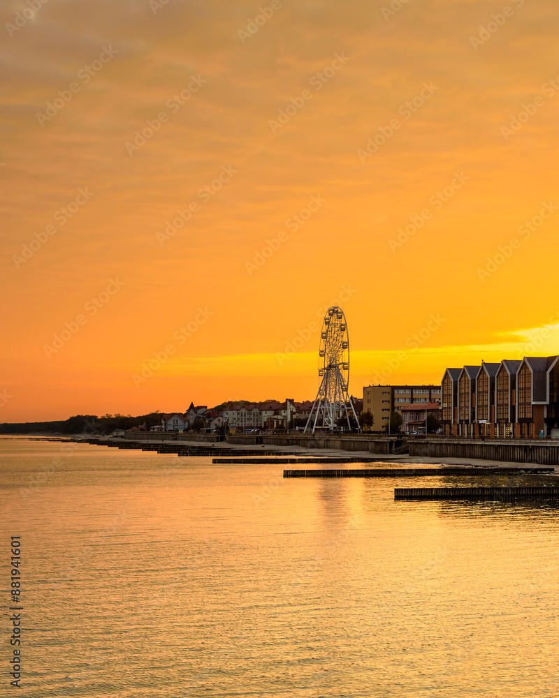 View of promenade of resort town of Zelenogradsk on the coast of Baltic sea at sunrise. Russia