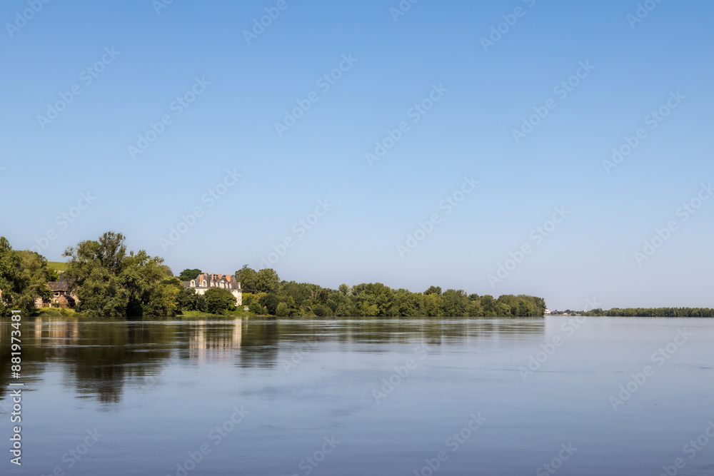 the banks of the Loire river seen from a boat the banks of the Loire river seen from a boat