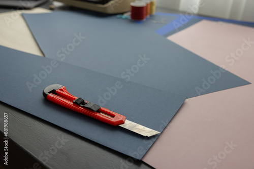Tableau sur toile High-quality image of a person binding a book using traditional coptic stitch technique