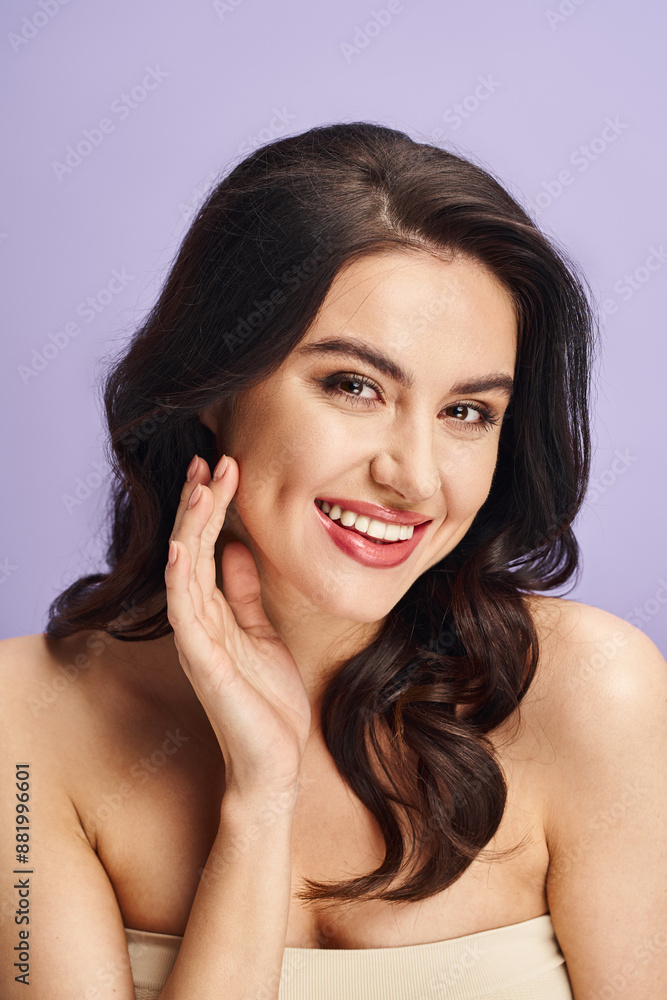 Woman with natural beauty smiling while posing for a picture. Woman with natural beauty smiling while posing for a picture.